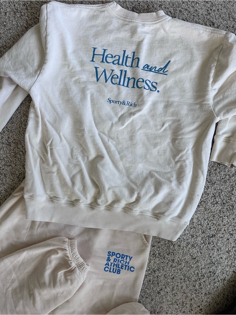 Sporty & Rich Cream Crewneck Sweatshirt with Blue Logo